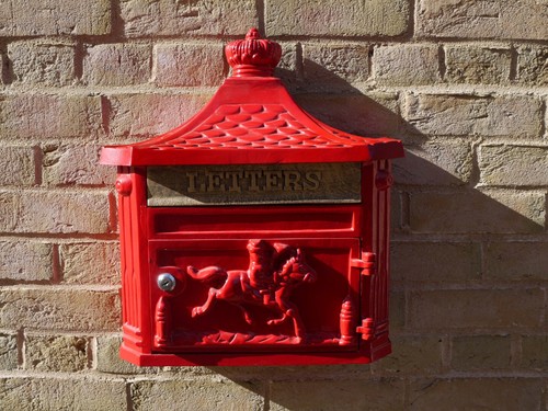 Red cast aluminium horse - red,